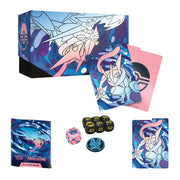 Pokémon trading card game set with cards, dice, and player's guide on a white background