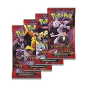 Three packs of Pokémon trading cards with colorful designs on a white background