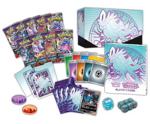 Pokémon trading card game products including cards, a player's guide, and dice on a white background