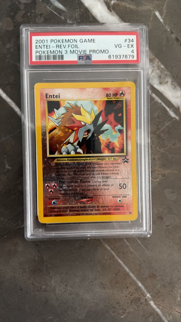 A graded Pokémon trading card of Entei from the 2001 Pokémon Game, sealed in a PSA slab. The card is a Pokémon 3 Movie Promo foil, graded VG-EX by PSA.