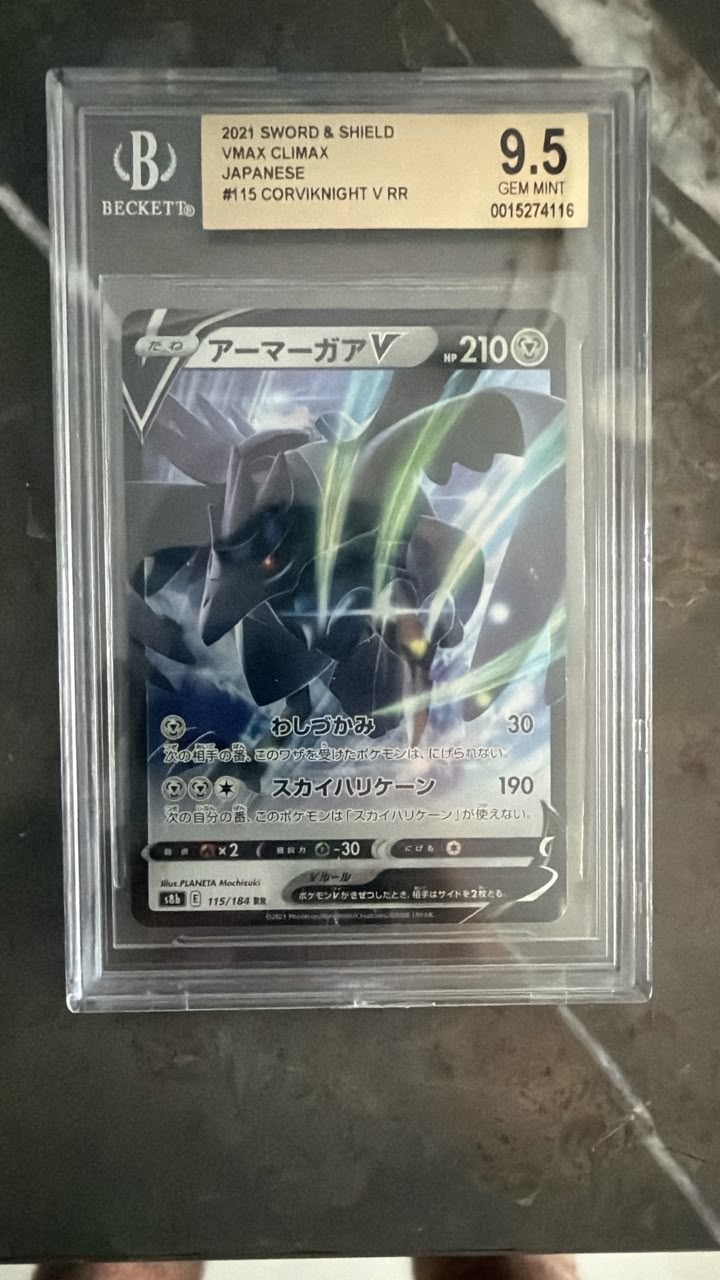 A graded Pokémon TCG card in a clear plastic slab. The card is a 2021 Sword & Shield VMAX Climax Japanese #15 Corvoda V RR, graded a 9.